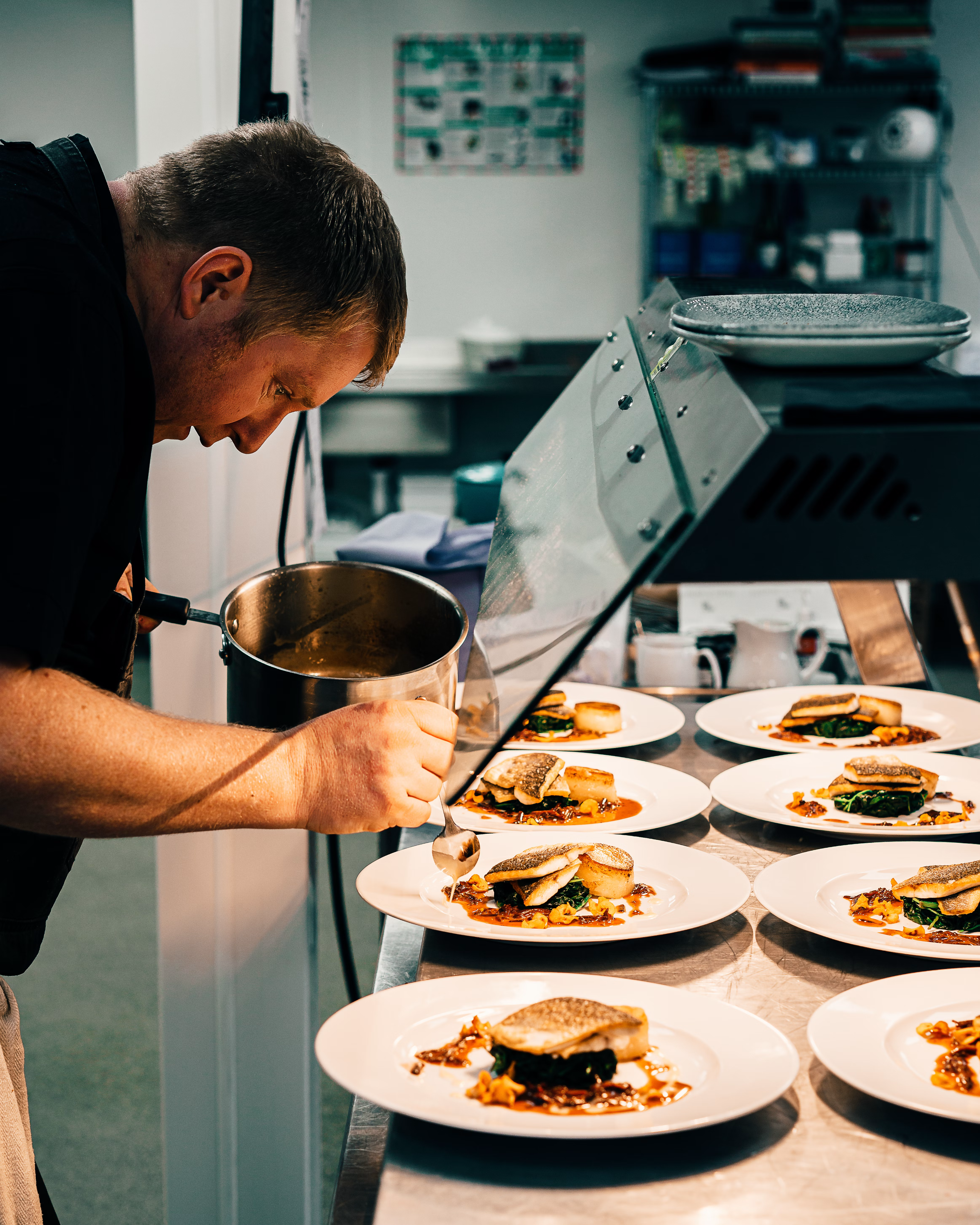 Chef prepping dish